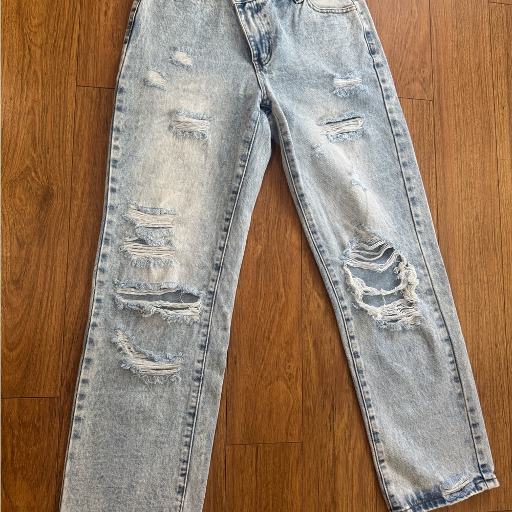 SHEIN Relaxed Blue Denim Jumpsuit with Distressed Details
